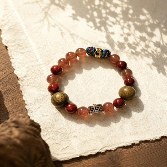 A handwritten gift note beside Strandzen bracelet materials