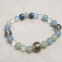 Blue Interval finished crystal bracelet in pale blue, pale green, clear, and smoky gray tones thumbnail