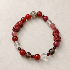 Crimson Oath finished crystal bracelet primary view with carved red figures thumbnail