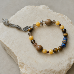 Golden Passage finished crystal bracelet in golden yellow, tiger-brown, smoky clear, and warm wood tones thumbnail