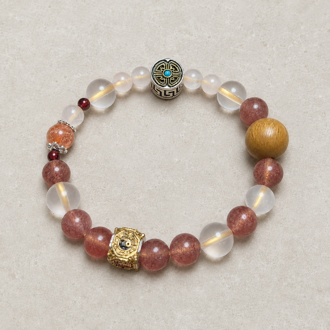 Rose Token finished crystal bracelet primary view with turquoise-colored and gold-tone details