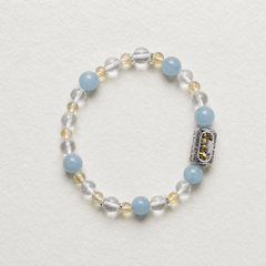 Still Ground Plan B Calm bracelet shown as a complete pale blue, clear, smoky, and soft yellow composition thumbnail