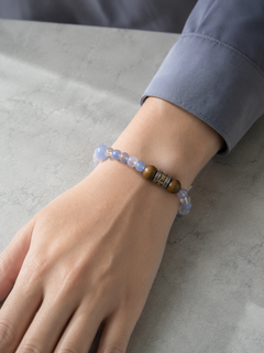 Maze Confidence Plan B bracelet worn on the wrist with a blue shirt thumbnail