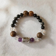 Double Guard Protection bracelet on white fabric with silver focal bead thumbnail