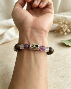 Double Guard Protection bracelet worn on wrist with silver focal bead thumbnail