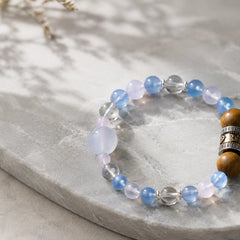 Maze Confidence Plan B bracelet with pale blue, clear, lavender, and warm brown beads on stone thumbnail