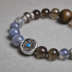 Double Guard Plan B round geometric focal bead with a turquoise-blue center accent thumbnail