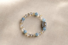 Still Ground Plan B bracelet in pale blue and clear tones photographed in soft natural light thumbnail
